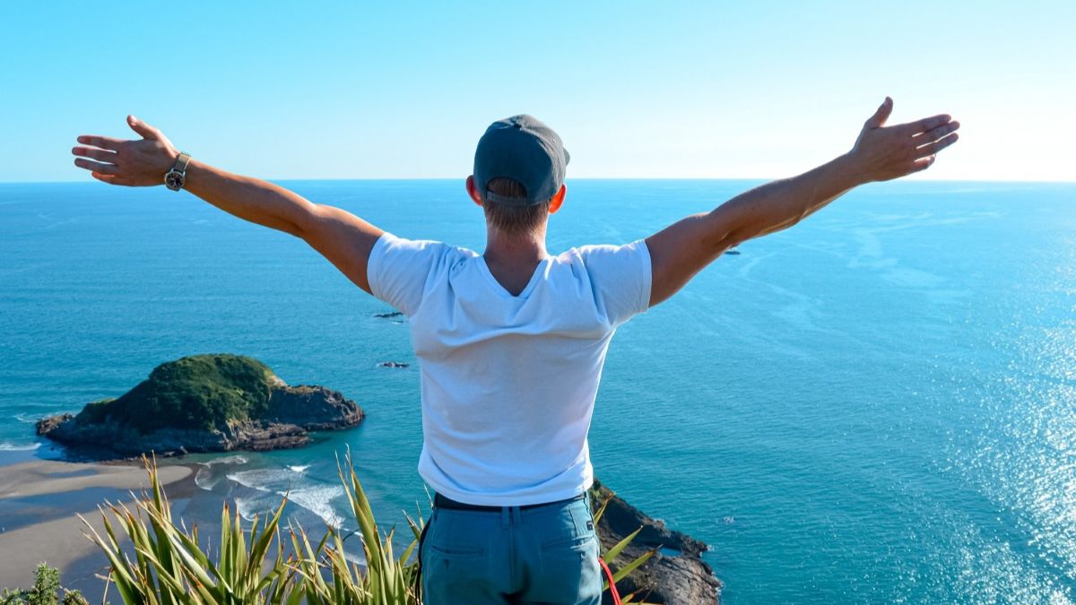 Liam admiring the view of the ocean from the top of Paritutu Rock in New Plymouth, North Island, New Zealand